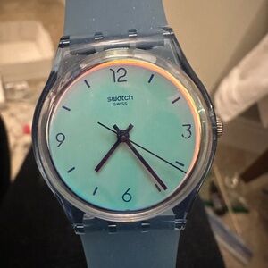 SWATCH never worn Blue Strap Watch with White opalescent Dial. It's ticking! NEW
